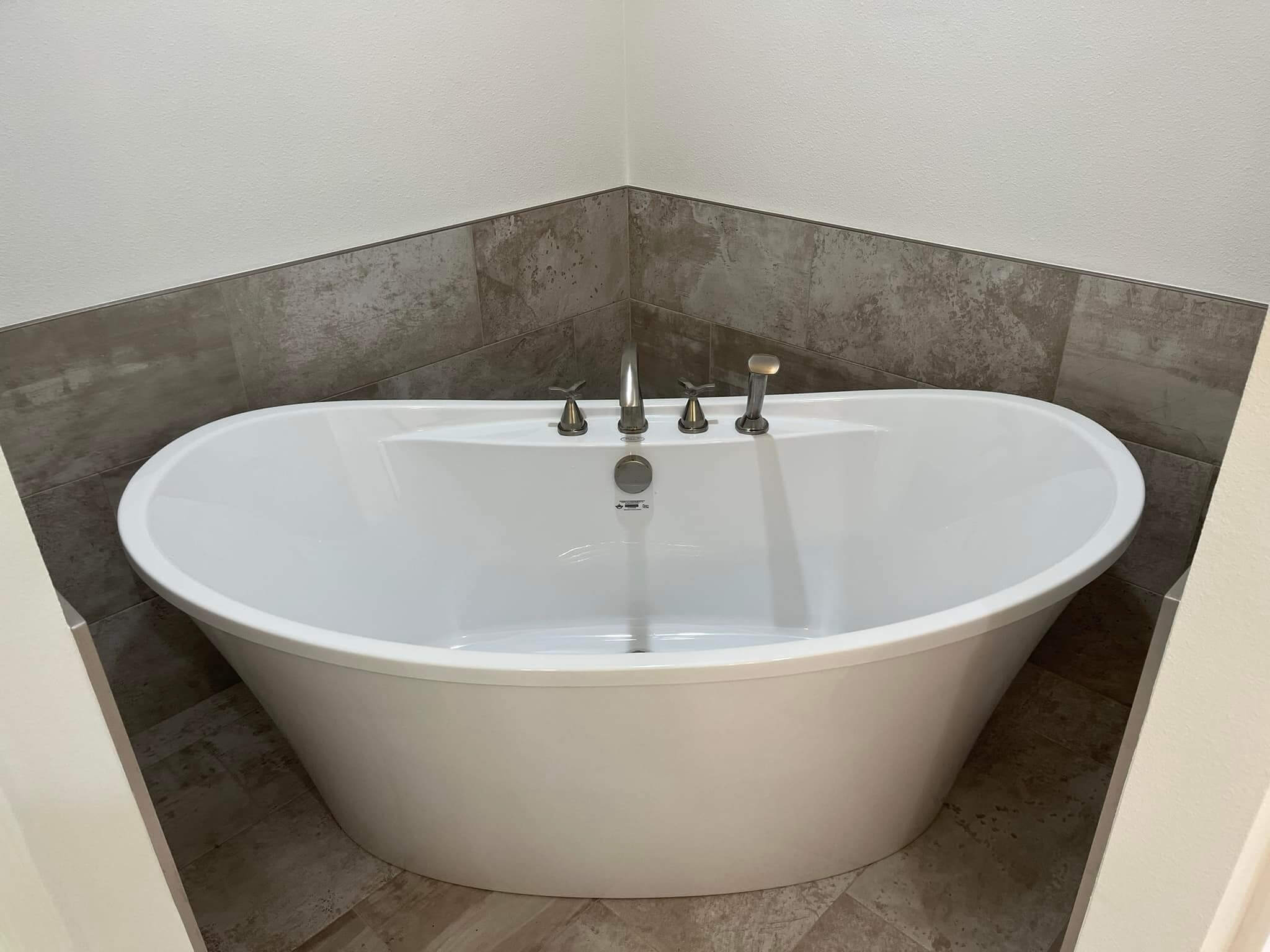 Modern freestanding bathtub installed during bathroom remodel in Hot Springs, AR.