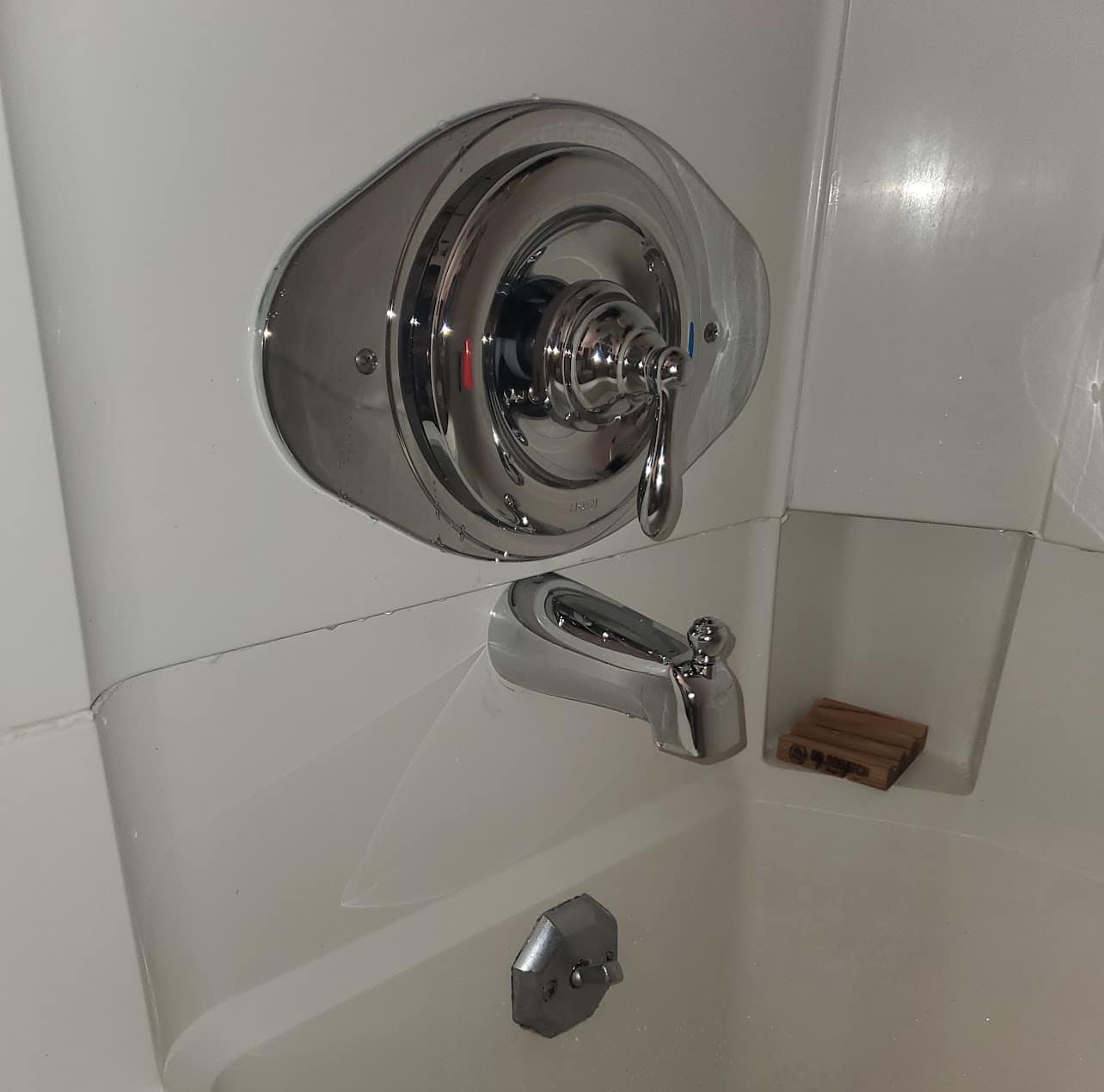 Installed chrome tub and shower valve upgrade in Hot Springs bathroom.